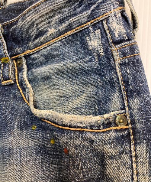 DSQUARED2（ディースクエアード）DSQUARED2 (ディースクエアード) ダメージペイントデニムパンツ インディゴ サイズ:42の古着・服飾アイテム