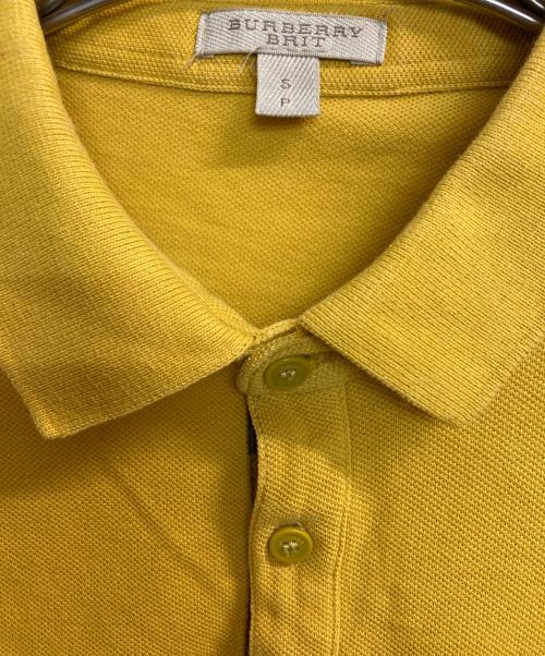 BURBERRY BRIT（バーバリーブリット）BURBERRY BRIT (バーバリーブリット) ポロシャツ イエロー サイズ:Ｓの古着・服飾アイテム