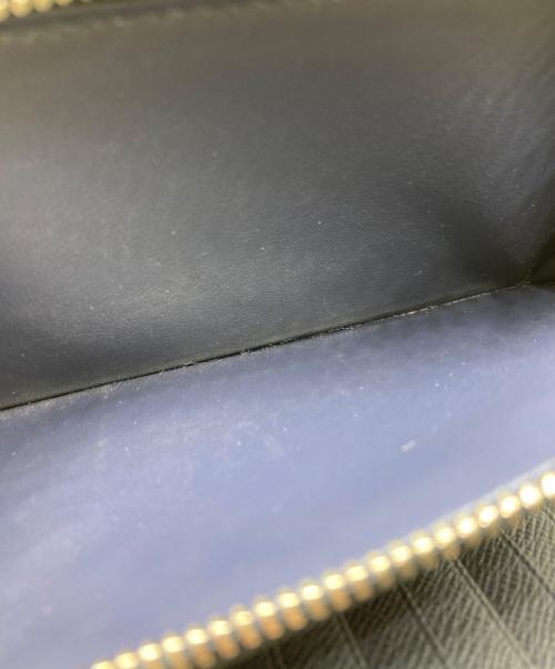 LOUIS VUITTON（ルイ ヴィトン）LOUIS VUITTON (ルイ ヴィトン) ヴェルティカル タイガジッピーウォレット ネイビーの古着・服飾アイテム