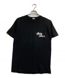 stussy（ステューシー）の古着「Roman Holiday T-shirt」｜ブラック
