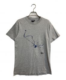 stussy×WTAPS（ステューシー×ダブルタップス）の古着「DRIP TECHNIQUE T-Shirt」｜グレー