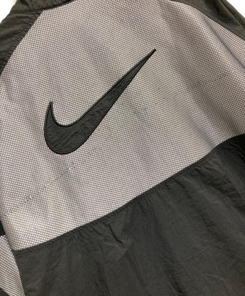 NIKE（ナイキ）NIKE (ナイキ) ビッグスォッシュナイロンプルオーバージャケット ブラック×ホワイト サイズ:Ｍの古着・服飾アイテム