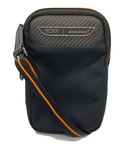 TUMI（トゥミ）TUMI (トゥミ) マクラーレンコラボミニショルダーバッグ ブラック×オレンジの古着・服飾アイテム