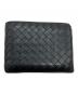 BOTTEGA VENETA（ボッテガベネタ）の古着「イントレチャート2つ折り財布」｜ブラック