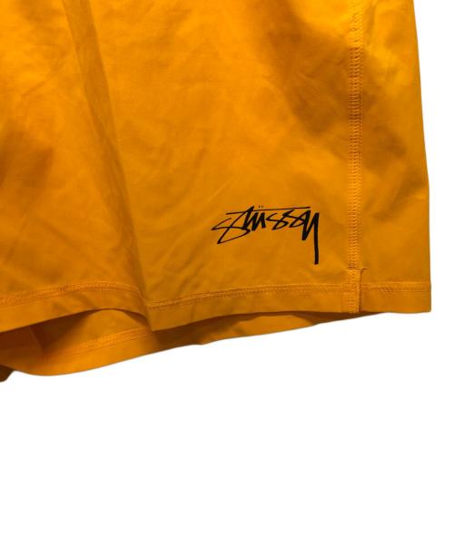 stussy（ステューシー）stussy (ステューシー) NIKE (ナイキ) WATER SHORT SUNDIAL オレンジ サイズ:XLの古着・服飾アイテム