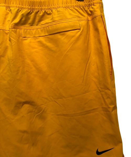 stussy（ステューシー）stussy (ステューシー) NIKE (ナイキ) WATER SHORT SUNDIAL オレンジ サイズ:XLの古着・服飾アイテム