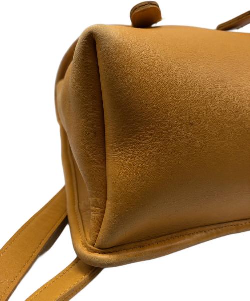 COACH（コーチ）COACH (コーチ) レザーミニリュック イエローの古着・服飾アイテム