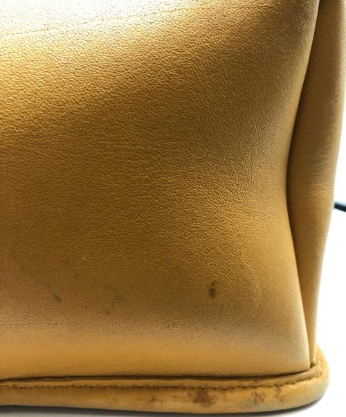 COACH（コーチ）COACH (コーチ) レザーミニリュック イエローの古着・服飾アイテム