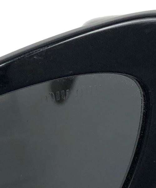 MIU MIU（ミュウミュウ）MIU MIU (ミュウミュウ) キャットアイサングラス ブラックの古着・服飾アイテム