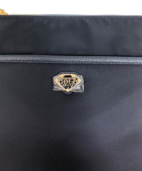 COCOCELUX GOLD（ココセリュックスゴールド）COCOCELUX GOLD (ココセリュックスゴールド) ナイロン2Wayバッグ ネイビーの古着・服飾アイテム