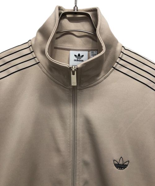adidas Originals（アディダスオリジナル）adidas originals (アディダスオリジナル) アウトライントレフォイル ファイヤーバード トラックトップ ベージュ サイズ:2XLの古着・服飾アイテム