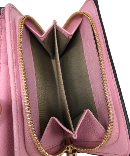 JIMMY CHOO（ジミーチュウ）JIMMY CHOO (ジミーチュウ) スタースタッズ2つ折り財布 ピンクの古着・服飾アイテム