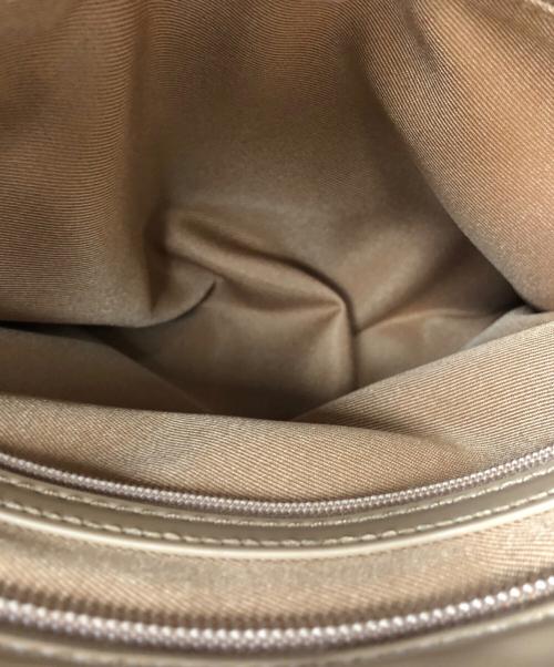 KITAMURA（キタムラ）KITAMURA (キタムラ) 2WAYエナメルトートバッグ ベージュの古着・服飾アイテム