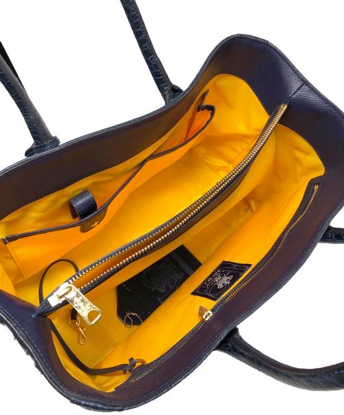 A.D.M.J.（エーディーエムジェイ）A.D.M.J. (エーディーエムジェイ) 型押しハンドバッグ ネイビーの古着・服飾アイテム