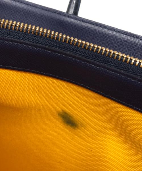 A.D.M.J.（エーディーエムジェイ）A.D.M.J. (エーディーエムジェイ) 型押しハンドバッグ ネイビーの古着・服飾アイテム