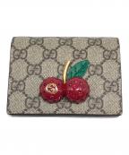 GUCCIグッチ）の古着「GGスプリーム チェリー レザーコンパクトウォレット」
