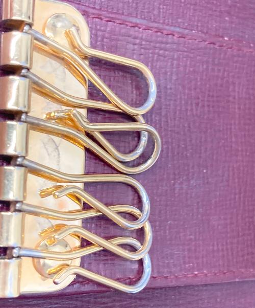 Cartier（カルティエ）Cartier (カルティエ) 6連キーケース ボルドーの古着・服飾アイテム