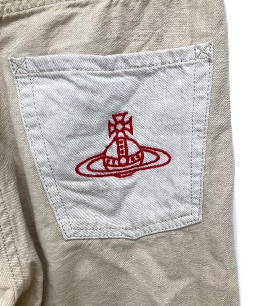 Vivienne Westwood RED LABEL（ヴィヴィアンウエストウッドレッドレーベル）Vivienne Westwood RED LABEL (ヴィヴィアンウエストウッドレッドレーベル) オーブ刺繍デニムパンツ ベージュ サイズ:02の古着・服飾アイテム
