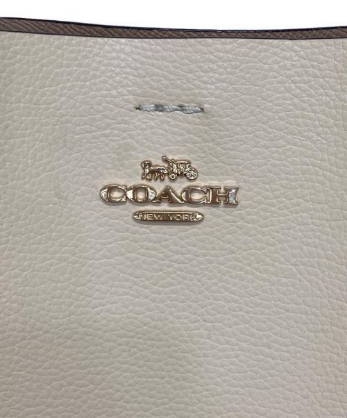 COACH（コーチ）COACH (コーチ) SIGNATURE MOLLIE BUCKET/2WAYバッグ アイボリーの古着・服飾アイテム
