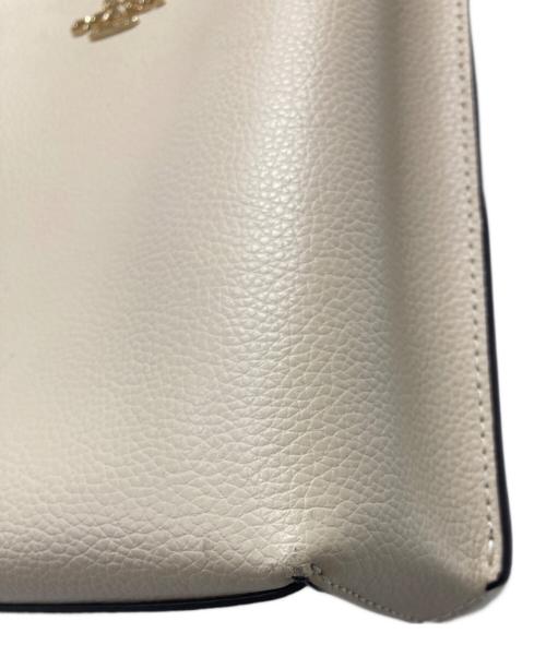 COACH（コーチ）COACH (コーチ) SIGNATURE MOLLIE BUCKET/2WAYバッグ アイボリーの古着・服飾アイテム