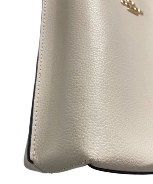 COACH（コーチ）COACH (コーチ) SIGNATURE MOLLIE BUCKET/2WAYバッグ アイボリーの古着・服飾アイテム