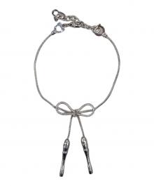 Christian Dior（クリスチャン ディオール）の古着「リボンモチーフブレスレット」｜シルバー
