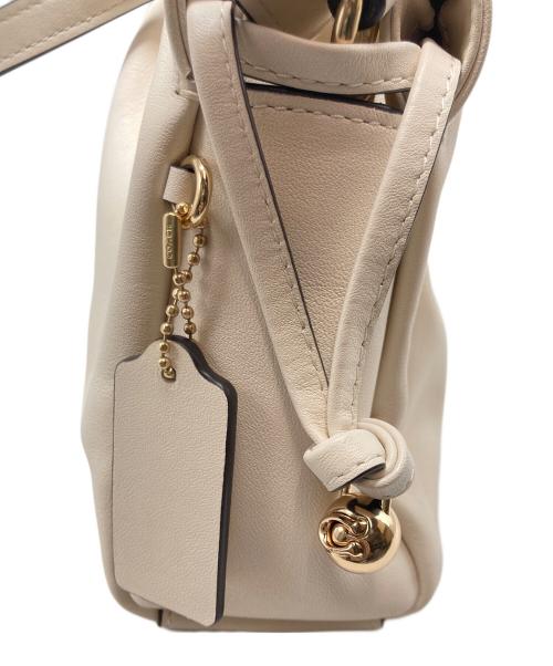 COACH（コーチ）COACH (コーチ) フェイショルダーバッグ・ルーシング ホワイトの古着・服飾アイテム