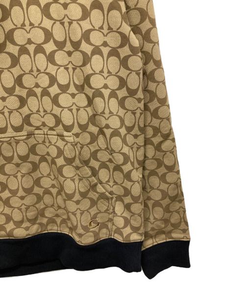 COACH（コーチ）COACH (コーチ) シグネチャープリントプルオーバーパーカー ベージュ サイズ:MEDIUMの古着・服飾アイテム