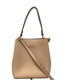 COACH（コーチ）の古着「スモール タウン バケット バッグ」｜ベージュ