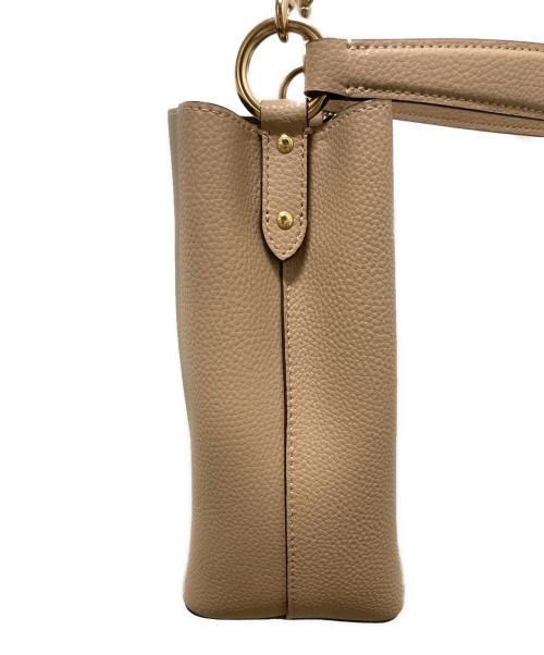 COACH（コーチ）COACH (コーチ) スモール タウン バケット バッグ ベージュの古着・服飾アイテム