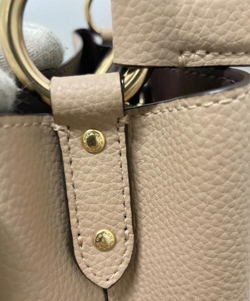 COACH（コーチ）COACH (コーチ) スモール タウン バケット バッグ ベージュの古着・服飾アイテム