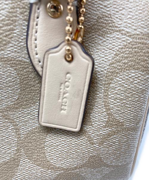 COACH（コーチ）COACH (コーチ) ミニ ローアン サッチェル・ブロックド シグネチャー キャンバス ベージュの古着・服飾アイテム