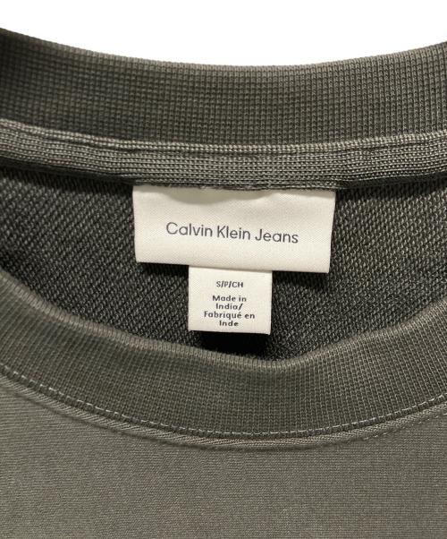 Calvin Klein Jeans（カルバンクラインジーンズ）Calvin Klein Jeans (カルバンクラインジーンズ) プレミアムテリーモノグラムクルーネックスウェットシャツ カーキ サイズ:Sの古着・服飾アイテム
