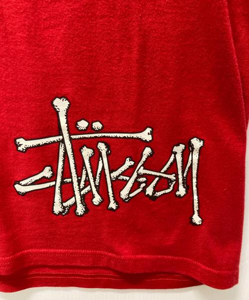 stussy（ステューシー）stussy (ステューシー) Bones Stock Tee レッド サイズ:Mの古着・服飾アイテム