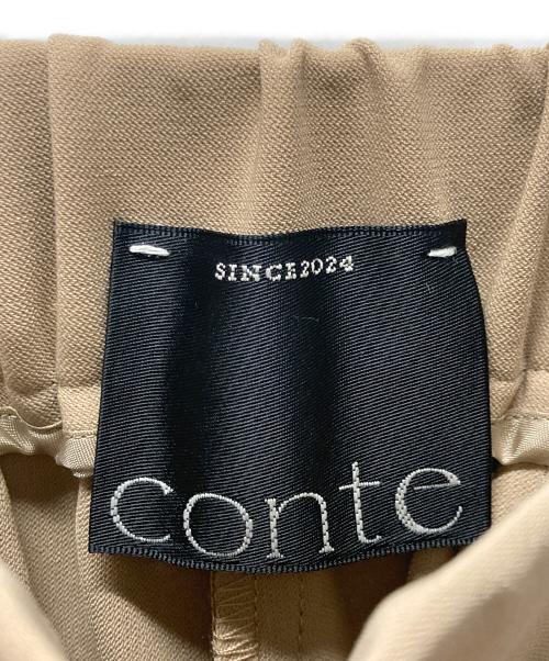 Conte（コンテ）Conte (コンテ) アシンメトリー タックパンツ ベージュ サイズ:36の古着・服飾アイテム