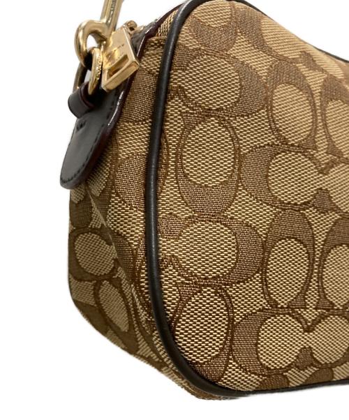 COACH（コーチ）COACH (コーチ) シグネチャー ショルダーバッグ ベージュの古着・服飾アイテム