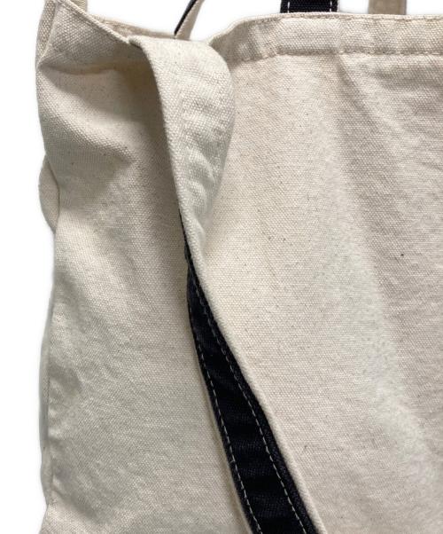 UNDERCOVERISM（アンダーカバーイズム）UNDERCOVERISM (アンダーカバーイズム) GURUGURU 2WAY キャンバストートバッグ ベージュ×ブラックの古着・服飾アイテム