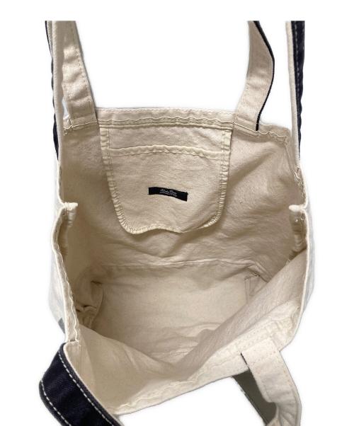 UNDERCOVERISM（アンダーカバーイズム）UNDERCOVERISM (アンダーカバーイズム) GURUGURU 2WAY キャンバストートバッグ ベージュ×ブラックの古着・服飾アイテム