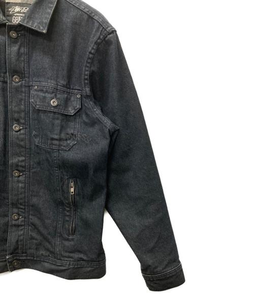 stussy（ステューシー）stussy (ステューシー) Authentic Gear バック刺繍デニムトラッカージャケット インディゴ サイズ:Lの古着・服飾アイテム