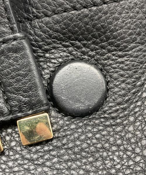 TORY BURCH（トリーバーチ）TORY BURCH (トリーバーチ) Britten ペブルオールレザーリュック ブラックの古着・服飾アイテム