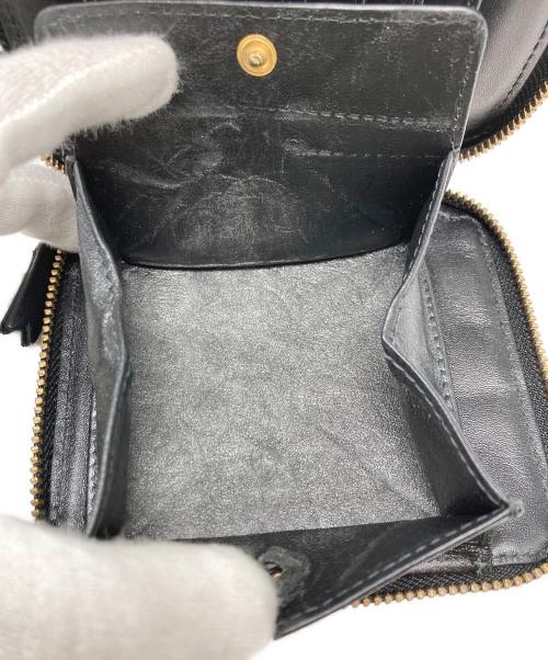 COMME des GARCONS（コムデギャルソン）COMME des GARCONS (コムデギャルソン) ラウンドファスナー2つ折り財布 ブラックの古着・服飾アイテム