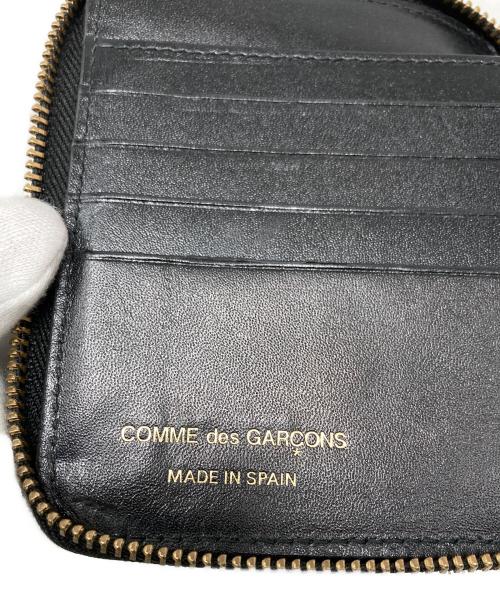 COMME des GARCONS（コムデギャルソン）COMME des GARCONS (コムデギャルソン) ラウンドファスナー2つ折り財布 ブラックの古着・服飾アイテム