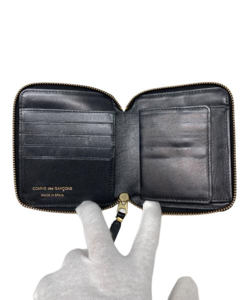 COMME des GARCONS（コムデギャルソン）COMME des GARCONS (コムデギャルソン) ラウンドファスナー2つ折り財布 ブラックの古着・服飾アイテム