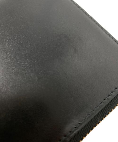 COMME des GARCONS（コムデギャルソン）COMME des GARCONS (コムデギャルソン) ラウンドファスナー2つ折り財布 ブラックの古着・服飾アイテム