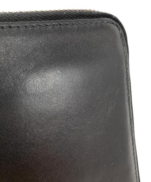 COMME des GARCONS（コムデギャルソン）COMME des GARCONS (コムデギャルソン) ラウンドファスナー2つ折り財布 ブラックの古着・服飾アイテム