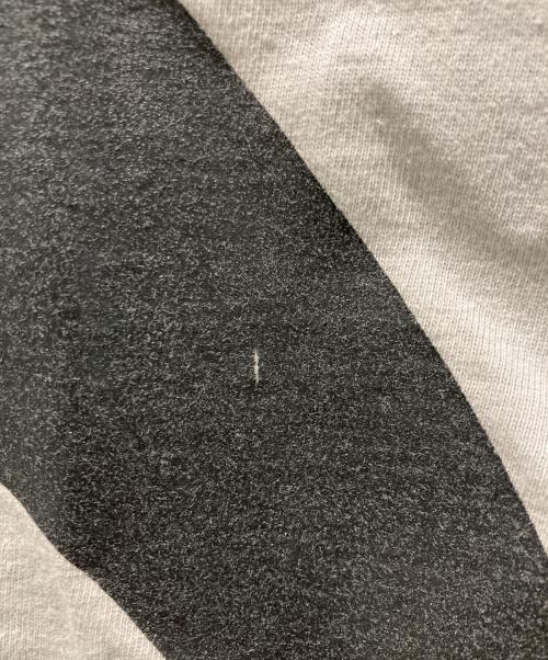 TAR COMMUNICATIONS（ター・コミュニケーションズ）TAR COMMUNICATIONS (ター・コミュニケーションズ) GOODENOUGH コラボプリントTシャツ グレー サイズ:Mの古着・服飾アイテム