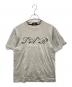 TAR COMMUNICATIONS（ター・コミュニケーションズ）の古着「コラボプリントTシャツ」｜グレー