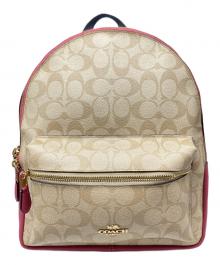 COACH（コーチ）の古着「シグネチャーリュック」｜ピンク×ベージュ