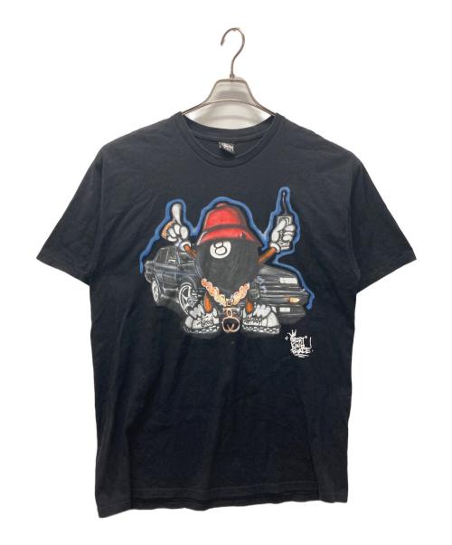 stussy（ステューシー）stussy (ステューシー) SHIRT KING PHADE (シャツキングフェイド) 8BALL MAN プリントTシャツ ブラック サイズ:XLの古着・服飾アイテム
