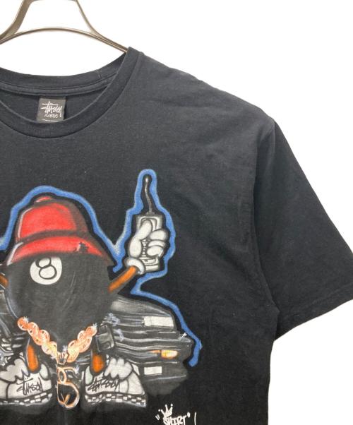 stussy（ステューシー）stussy (ステューシー) SHIRT KING PHADE (シャツキングフェイド) 8BALL MAN プリントTシャツ ブラック サイズ:XLの古着・服飾アイテム